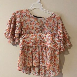 a flowered shirt